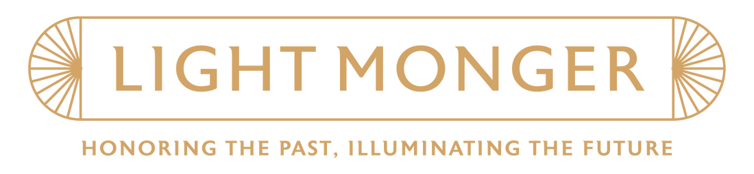 Logo of Light Monger with tagline 'Honoring the past, illuminating the future' in gold on a white background